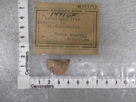 lithiophyllite altering to rhodochrosite