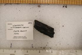 Hubnerite with Arsenic Coating