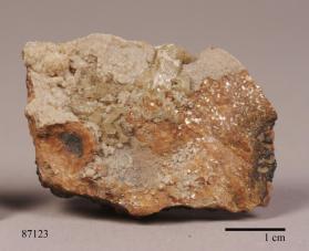 Friedelite with Barite crystals.