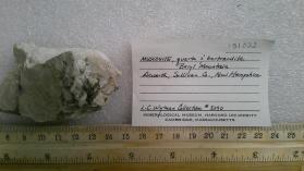 Muscovite quartz and bertrandite