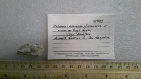 Alteration of uraninite or zircon on beryl crystal