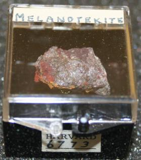 Melanotekite