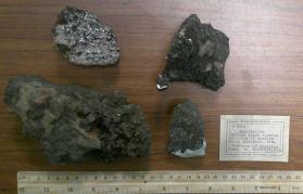 Amphibolite, extreme phase showing crystals of apatite mica, pyroxene, etc.