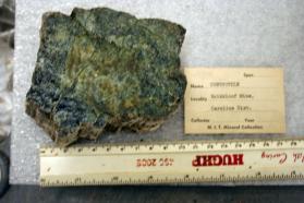 Chrysotile, fibrous veins in matrix