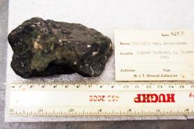 Tenorite var. Melaconite, cut and polished