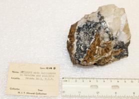 Antimony with Antimonite in Calcite and Siderite