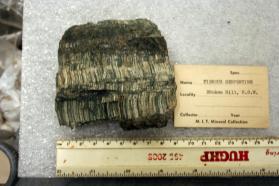 Chrysotile, fibrous veins in matrix