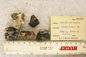 Ilmenite, curved platy crystals in Quartz