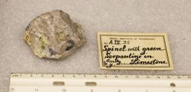 Spinel with Serpentine in Limestone